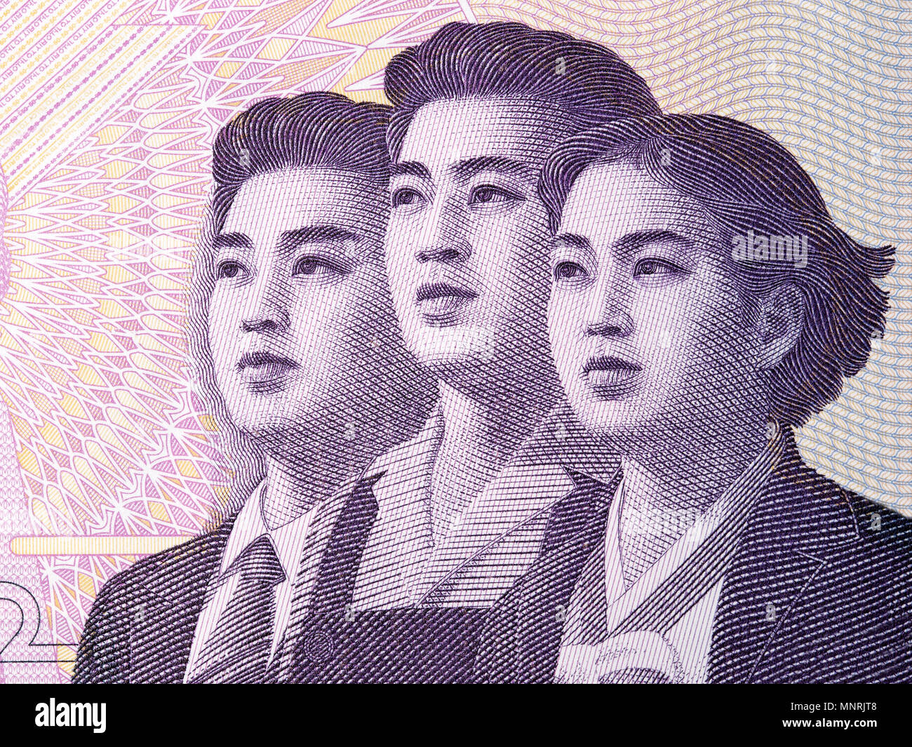 Young Koreans, a portrait from North Korean money Stock Photo