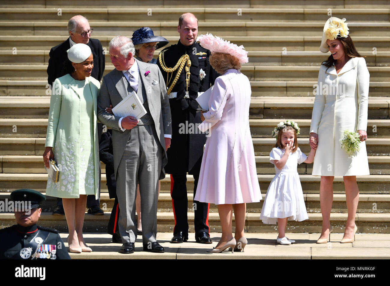 Meghan Markle s mother Doria Ragland the Prince Charles Prince of Wales the Duke of Cambridge the Duchess of Cornwall and Duchess of Cambridge holds her daughter Princess Charlotte s hand as they leav...