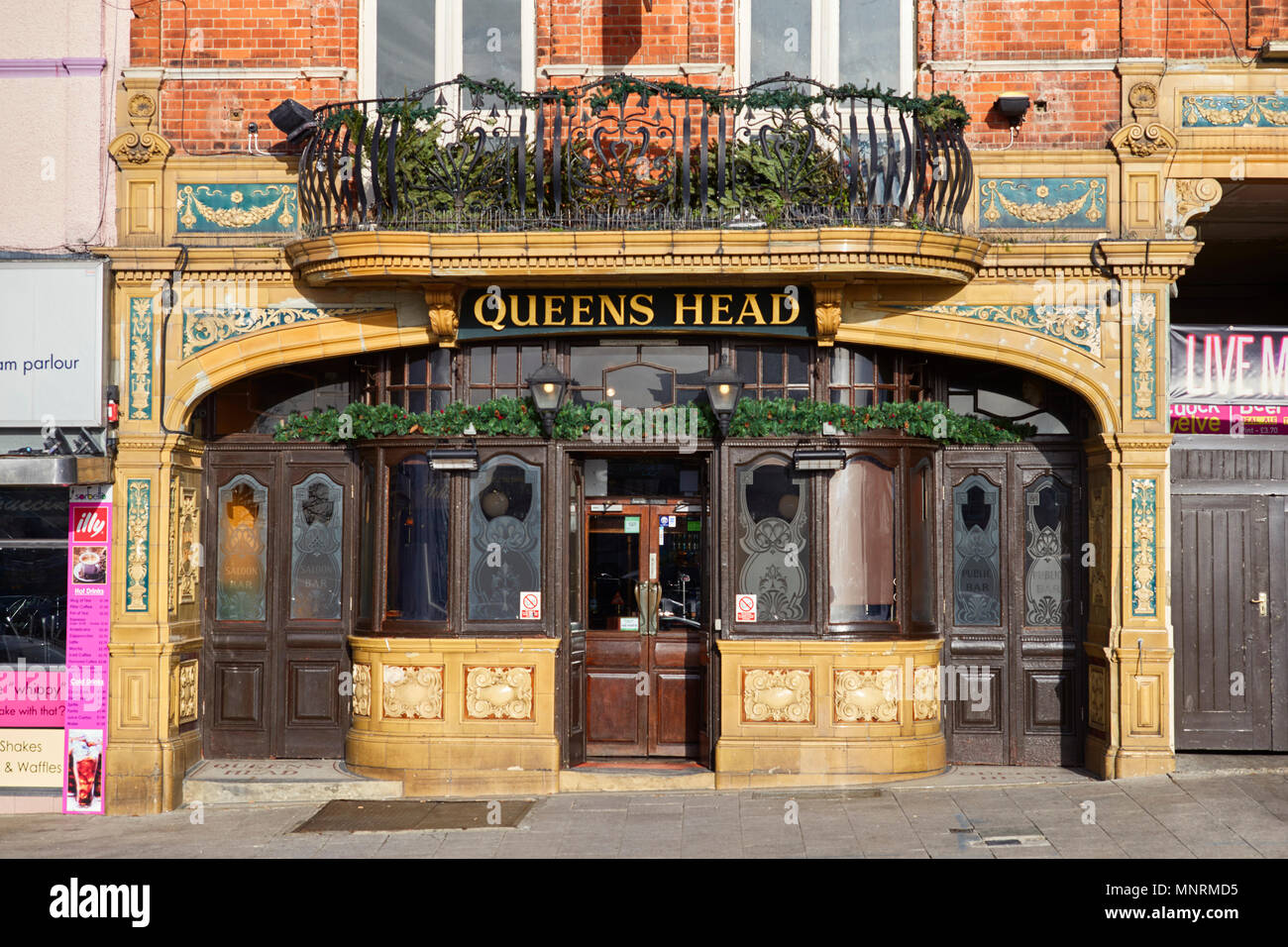 Tiled and decorative front of the Queens Head public house in Ramsgate, Kent Stock Photo