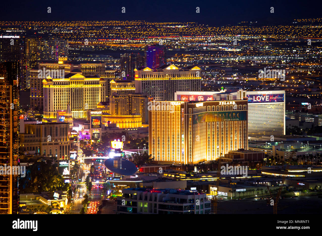 LAS VEGAS - MAY 15, 2018: Beautiful cityscape aerial view across Las Vegas Nevada at night with lights and many luxury resort hotels and casinos in vi Stock Photo