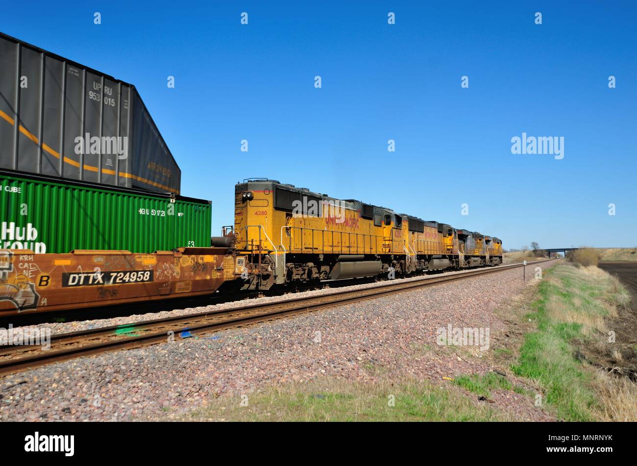 Maple Park, Illinois. A Union Pacific Railroad freight train, lead by four locomotive units, Stock Photo