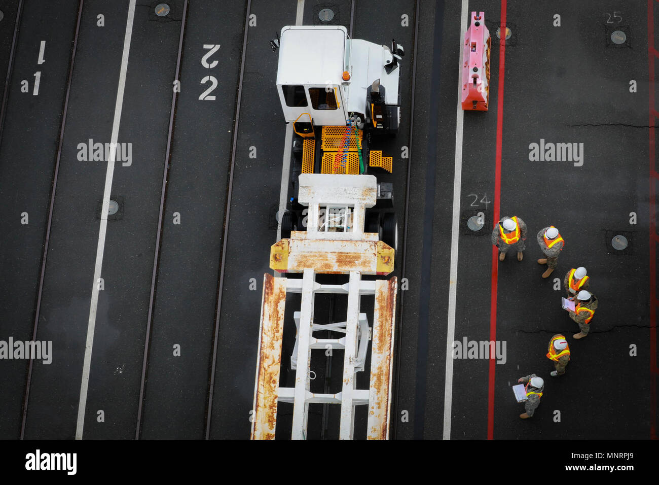 U.S. Army Reserve Soldiers prepare to transport a Twenty-foot ...