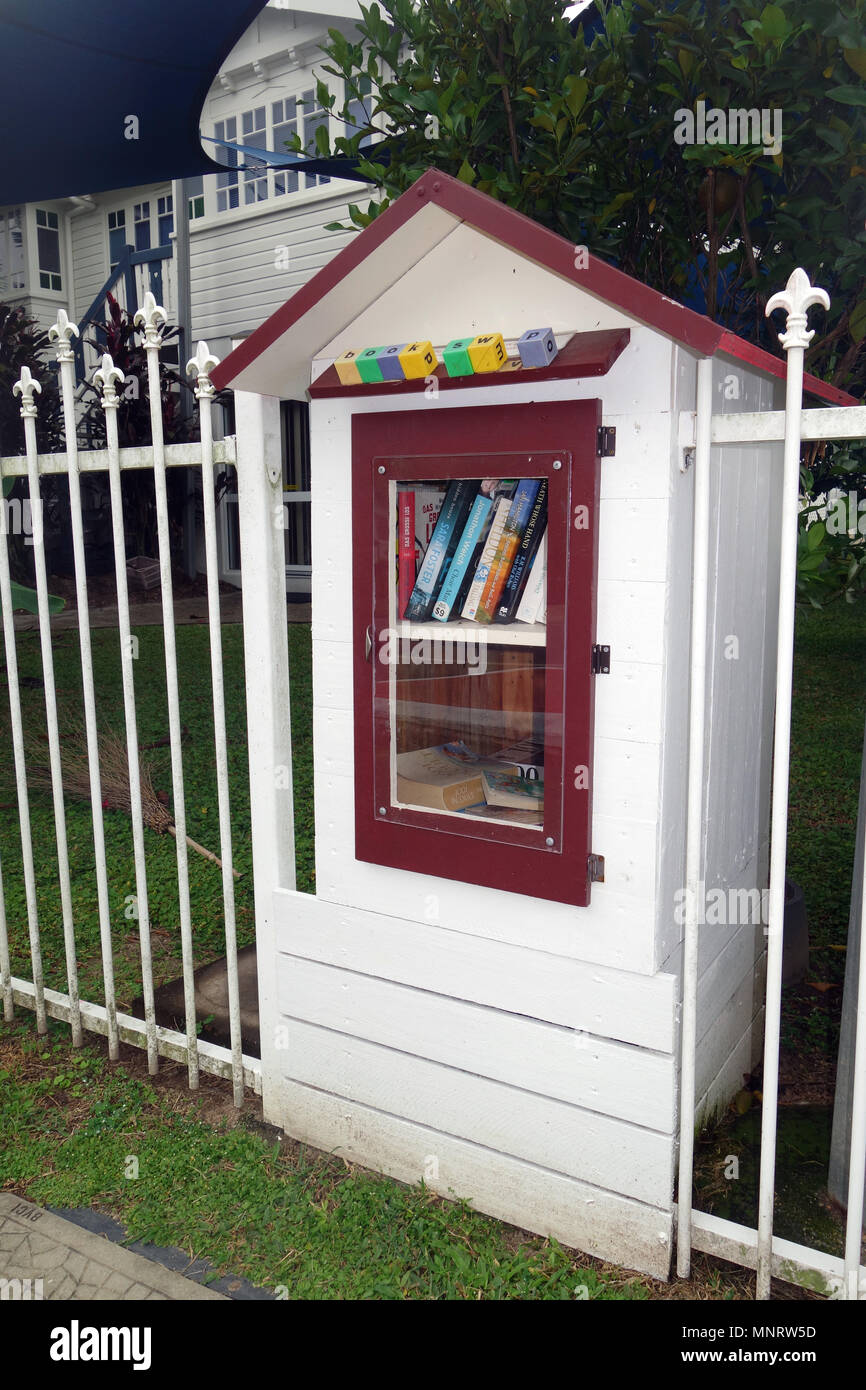 Free book swap (street library or little library) on street outside house, Edge Hill, Cairns, Queensland, Australia. No PR Stock Photo