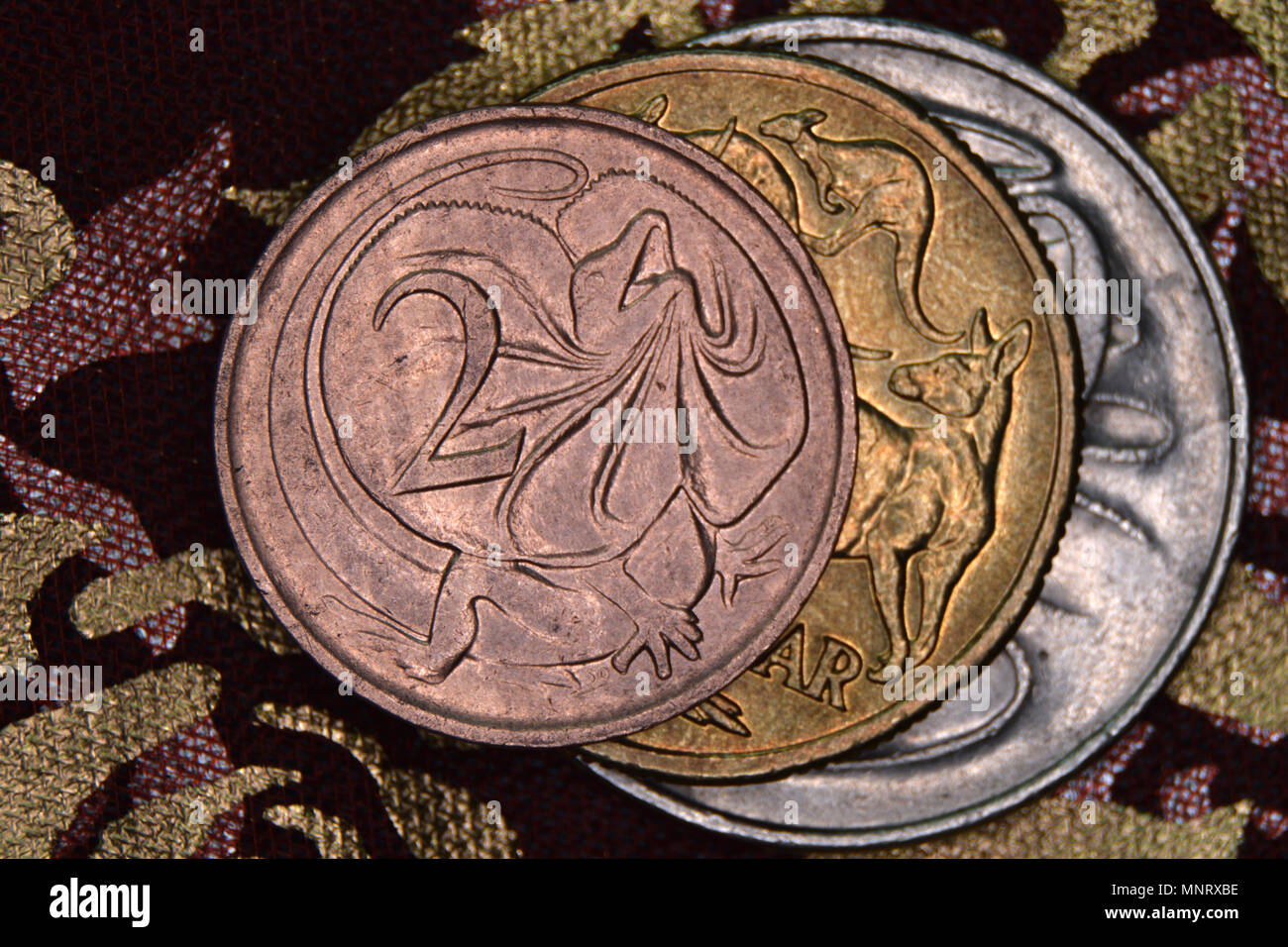 Finance pyramid - Australian coins stacked on each other. Two cent coin ...