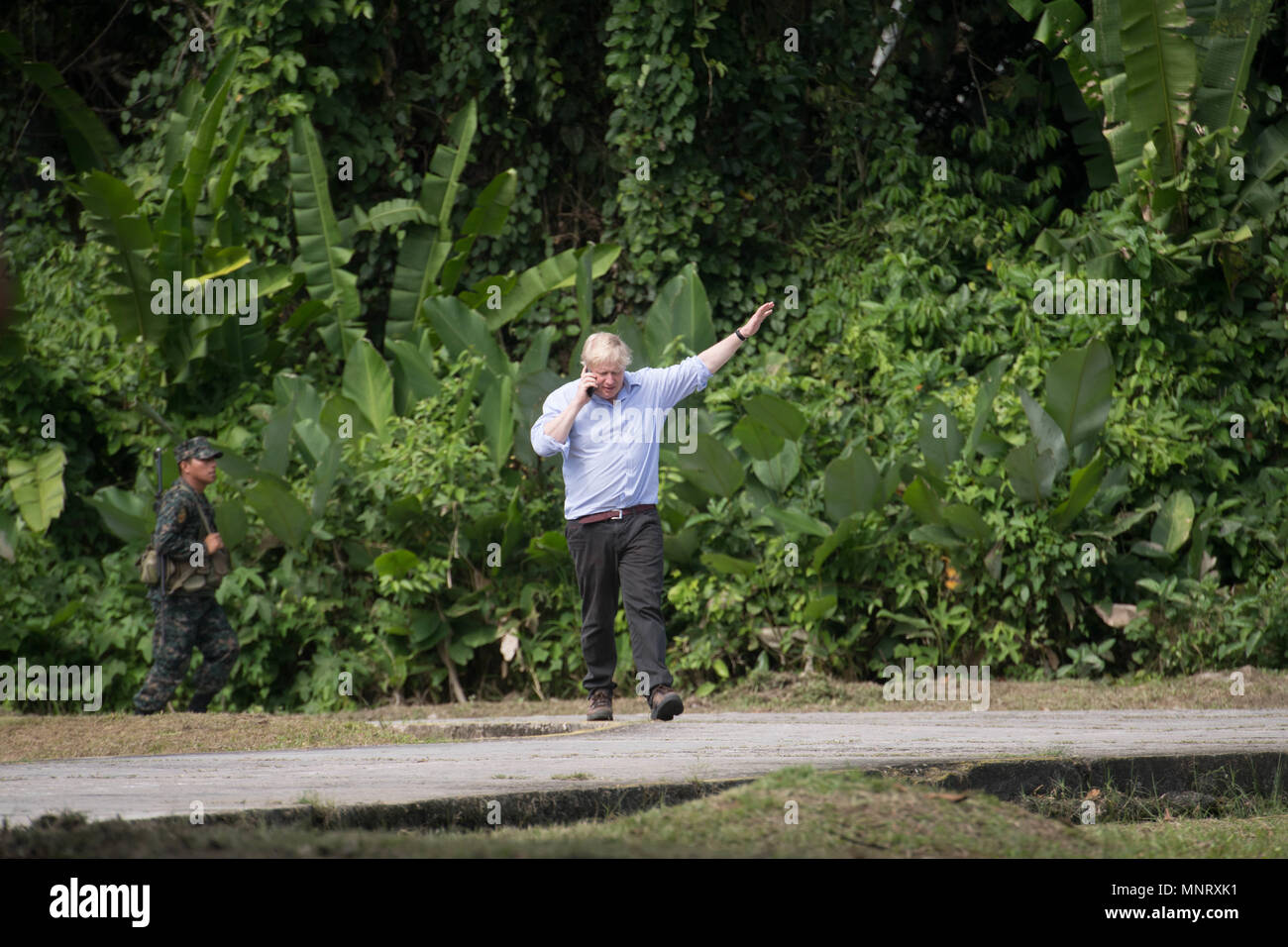 Foreign Secretary Boris Johnson makes a phone call during his visit to the Nanay Naval Base on the Amazon river near Iquitos in Peru to meet members of the Peruvian armed forces who are trying to prevent the illegal wildlife trade. Stock Photo