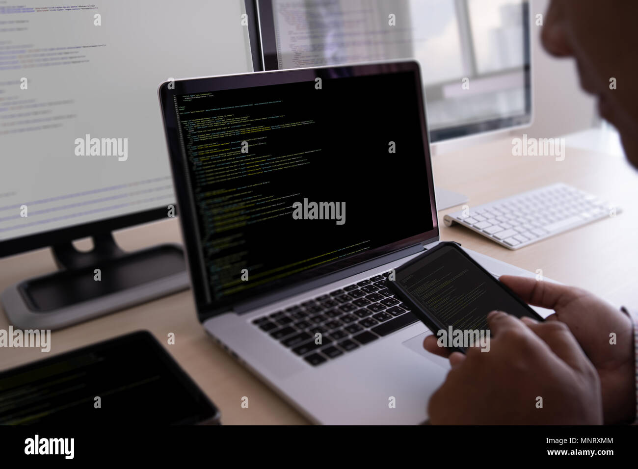 Programmer working Developing programming technologies Web Design Online Technology Stock Photo