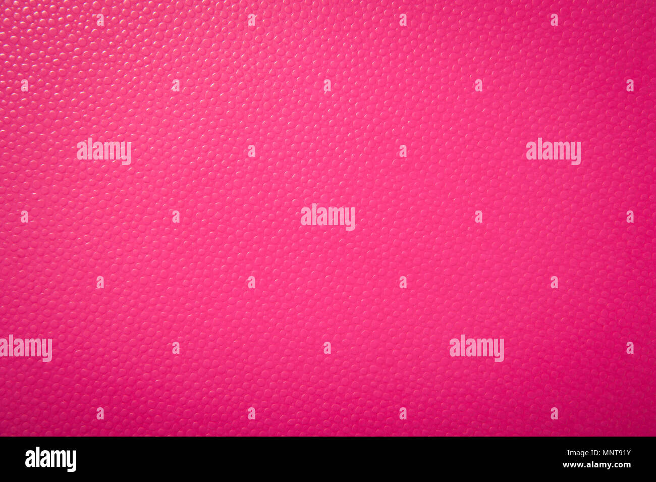 Texture of pink paper for background. Textured with convex balls Stock Photo