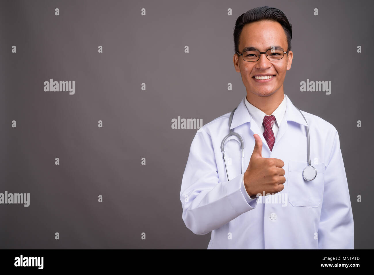Thumb up doctor hi-res stock photography and images - Alamy