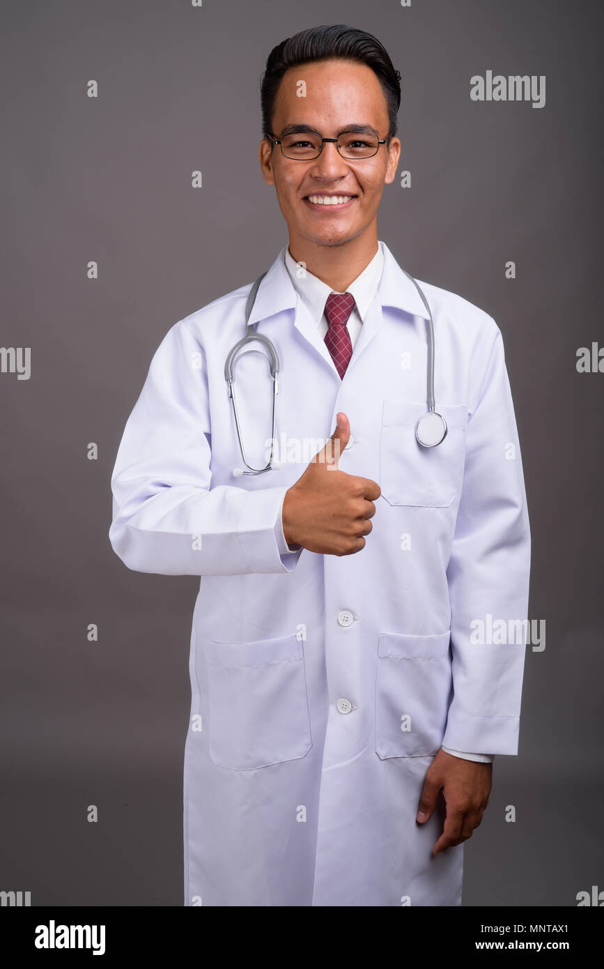 Thumb up doctor hi-res stock photography and images - Alamy