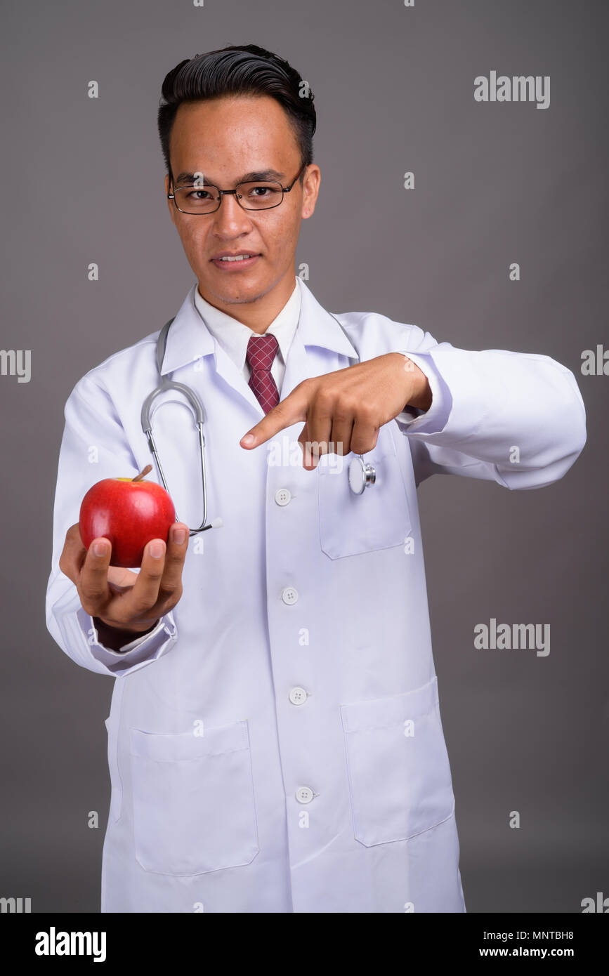 Asian young male doctor showing hi-res stock photography and images - Alamy