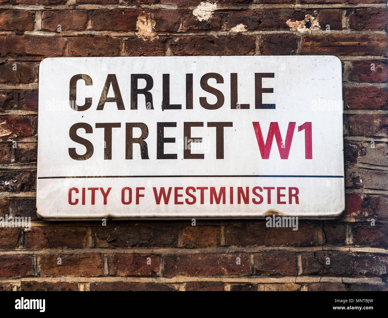 Soho Street Signs Series - Carlisle Street / Carlisle St - London's Soho district Street Signs Stock Photo