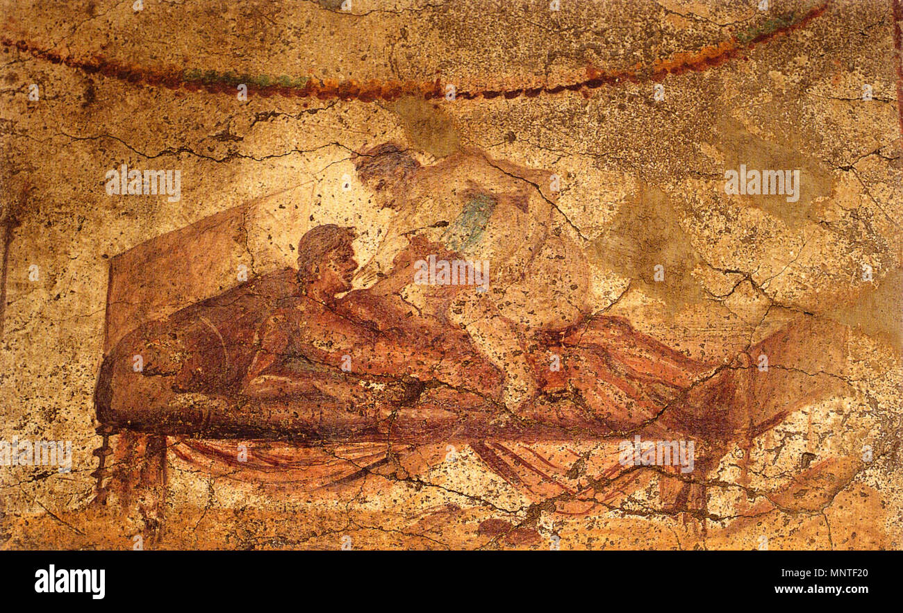 . English: Couple in bed. Woman waering a fascia pectoralis sits a partners lap. Fresco from south wall, upper zone above entrance to room f in the Lupanar in Pompeii. Ca. 70-79 AD. 21 July 2010. WolfgangRieger 1012 Pompeii - Lupanar - Couple2 Stock Photo