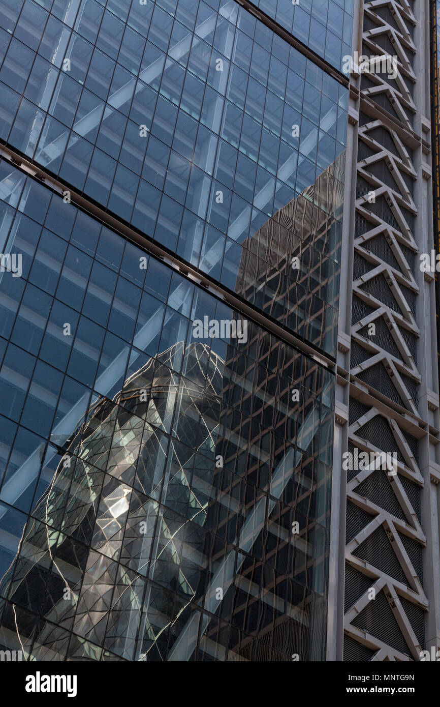 The Gherkin building reflected in the Leadenhall building Stock Photo