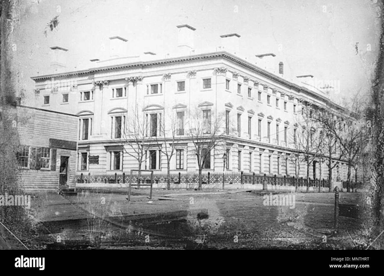 . [General Post Office from the corner of 8th Street and E Street, NW, Washington, D.C., the shop of Elija Dyer, merchant tailor, on the left]. Plumbe, John, 1809-1857, photographer. CREATED/PUBLISHED: [ca. 1846] Forms part of: Daguerreotype collection (Library of Congress). REPOSITORY: Library of Congress Prints and Photographs Division Washington, D.C. 20540 USA . circa 1846.   John Plumbe  (1809–1857)     Alternative names John Plumbe, Jr.  Description American photographer and publisher  Date of birth/death 13 July 1809 28 May 1857  Location of birth/death Powys Dubuque  Work location Wash Stock Photo