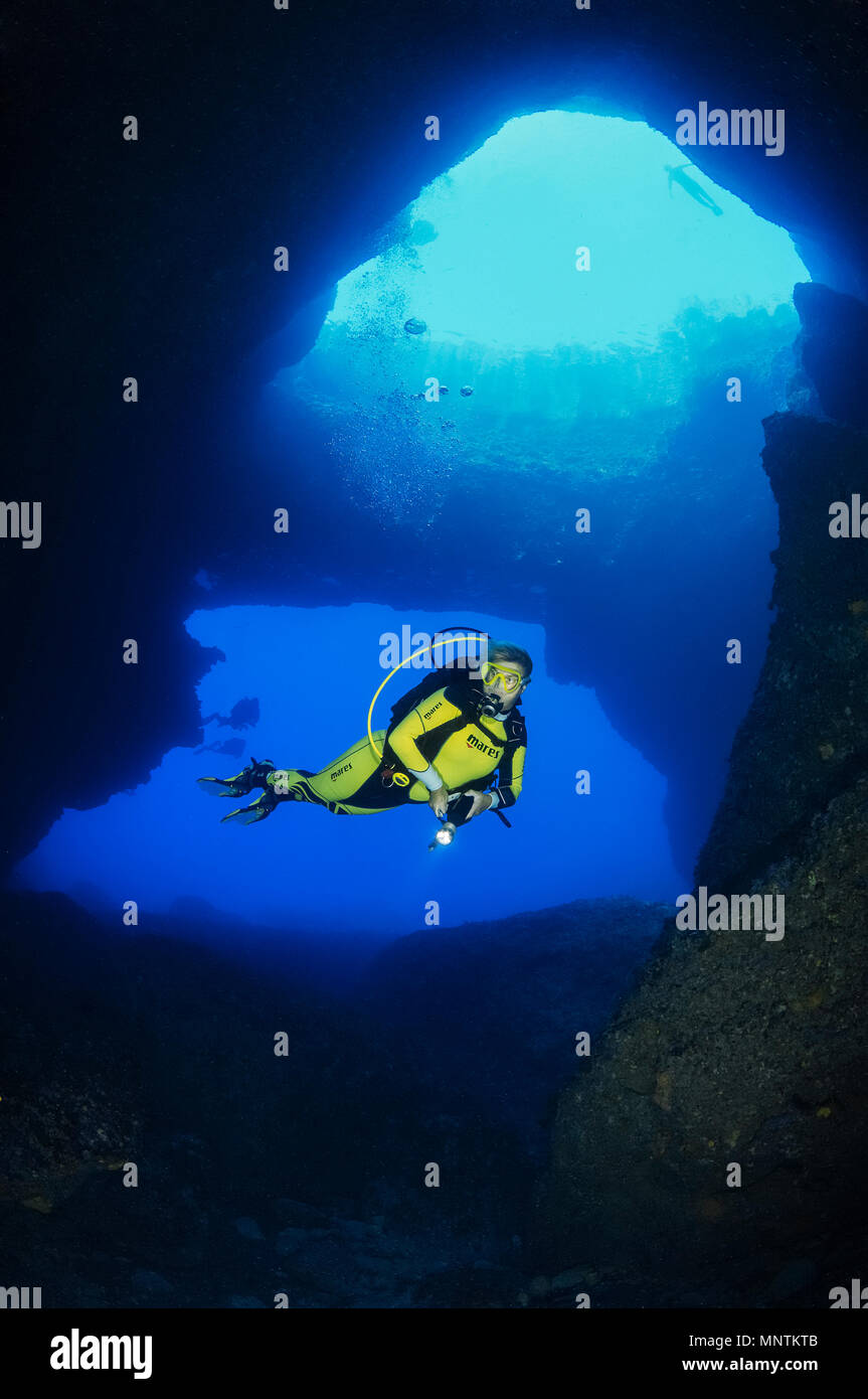 woman scuba diver, exploring Blue Hole, Gozo, Malta, Mediterranean Sea, Atlantic Ocean, MR Stock Photo