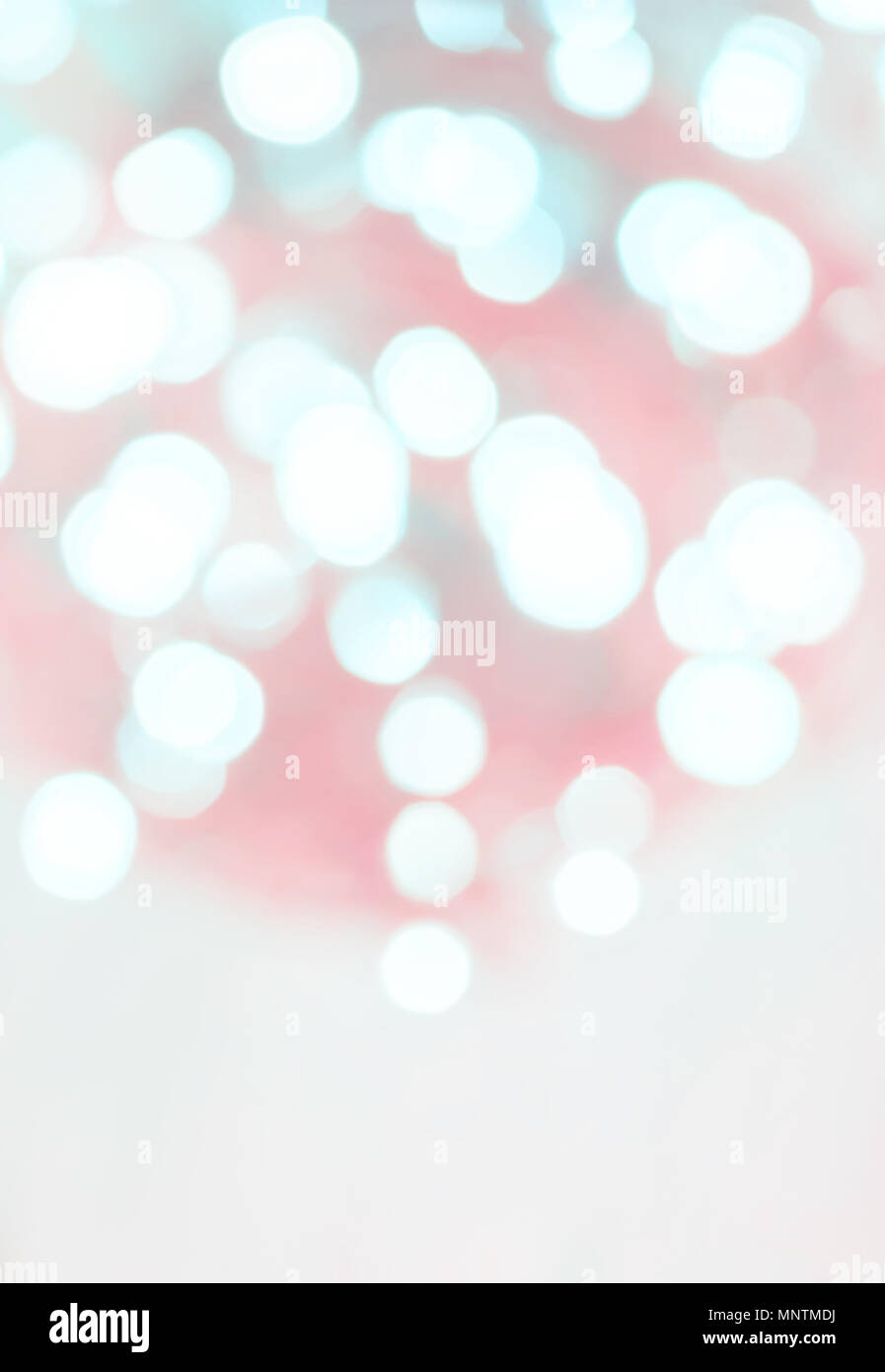 Winter lights in vertical red and creamy white for abstract background with copy space. Stock Photo
