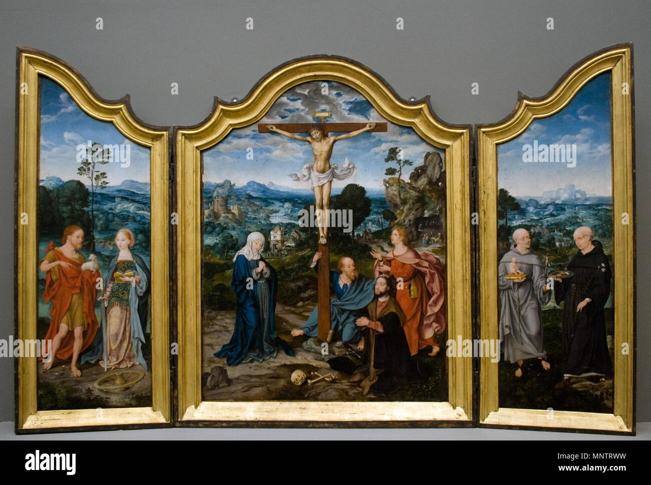The crucifixion with saints and a donor hi-res stock photography