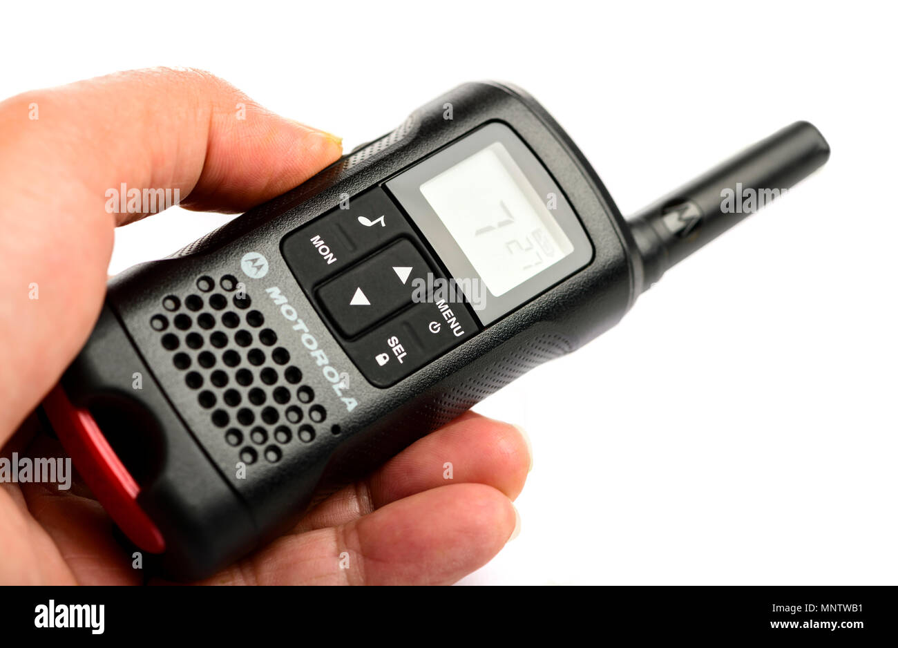 isolated hand holding a walkie talkie Stock Photo