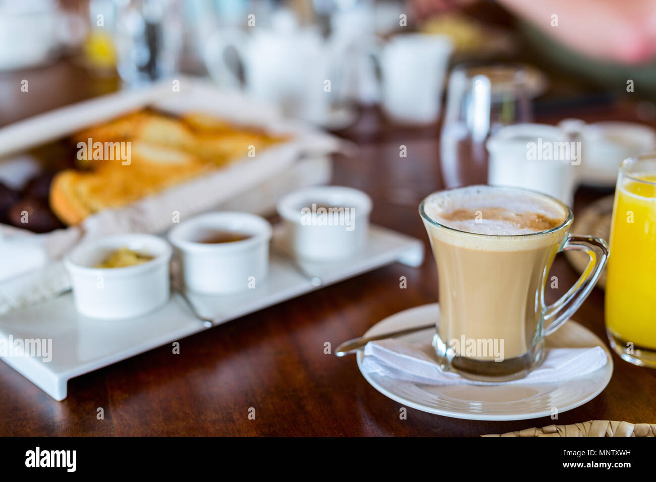 Fresh coffee in glass cup served for breakfast Stock Photo Alamy