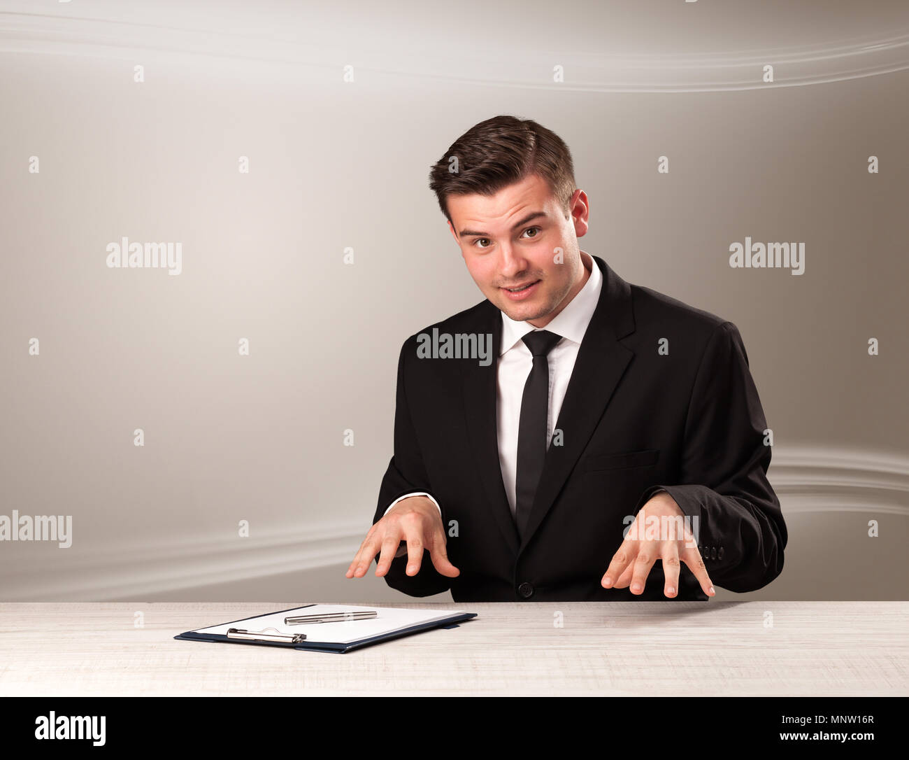 Televison presenter host in live show with blank background Stock Photo