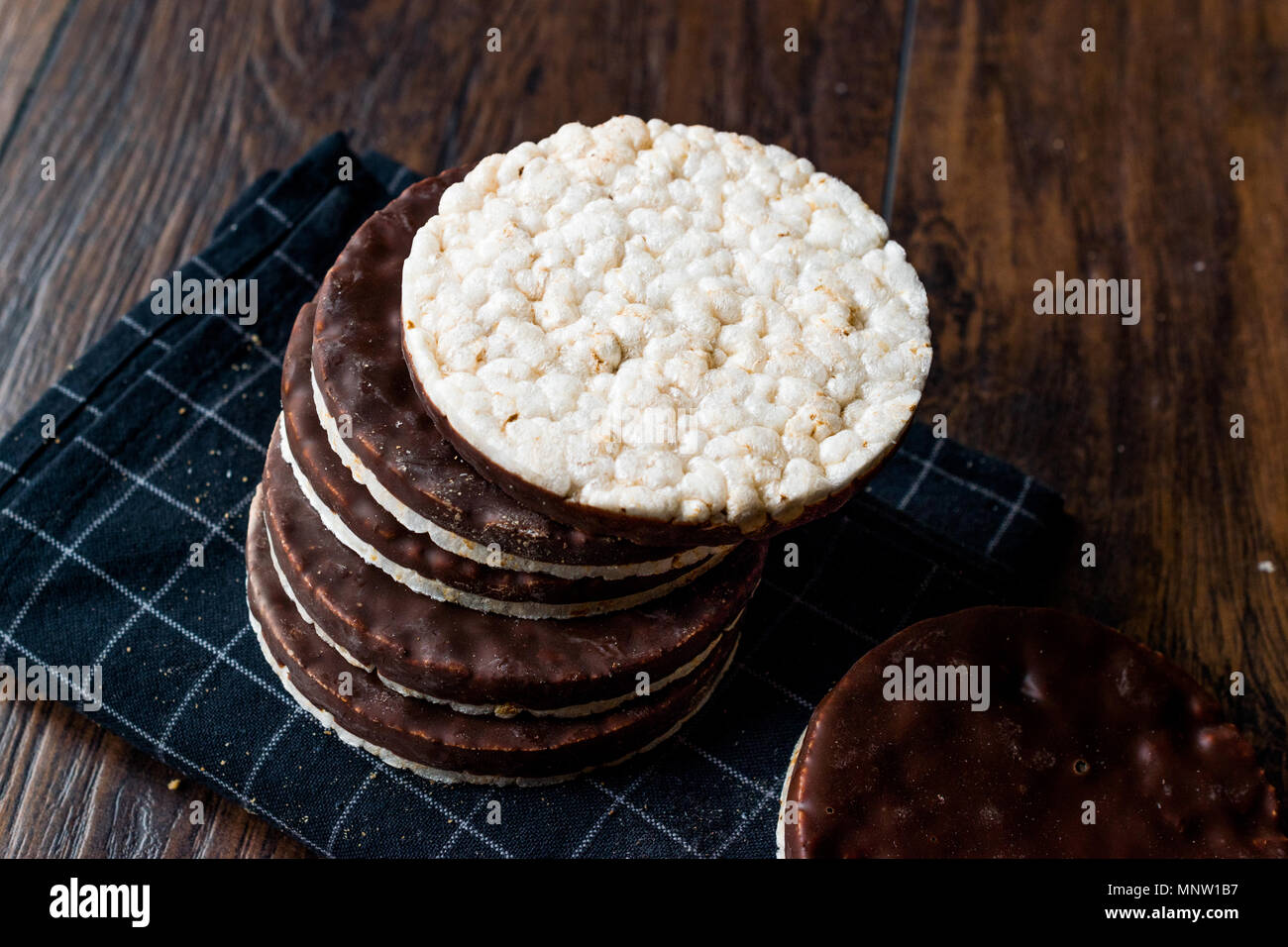 Stack Of Dark Chocolate Covered Rice Cakes or Corn Crackers. Appetizer