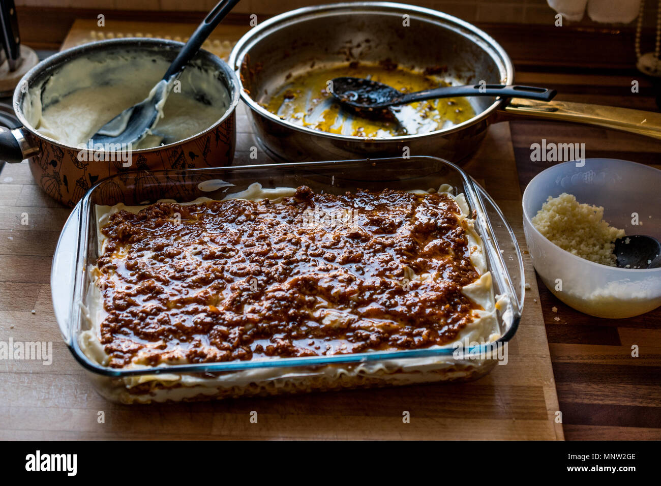Making Lasagna Bolognese at kitchen. Cooking Concept. Stock Photo