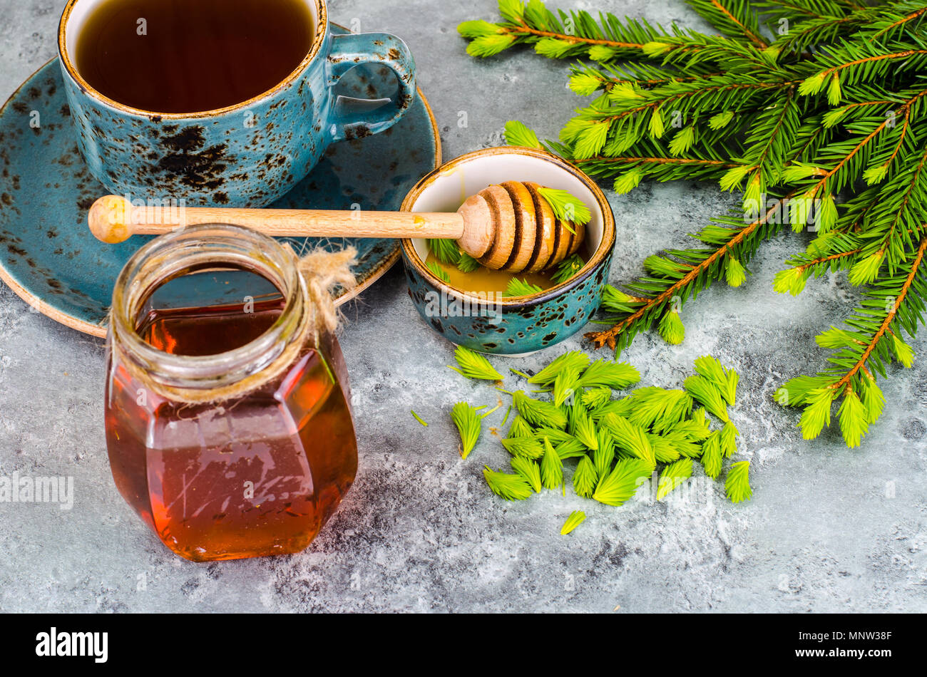 Honey, jam from green spruce shoots. Studio Photo Stock Photo