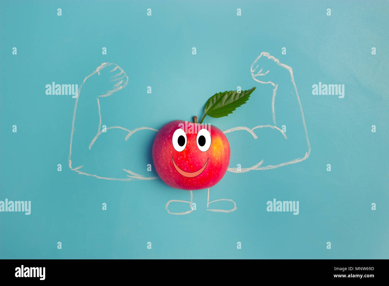 apple character with muscles. fitness and healthy eating concept Stock