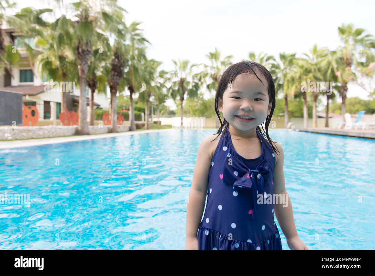 Asian little baby girl in swimming pool Stock Photo