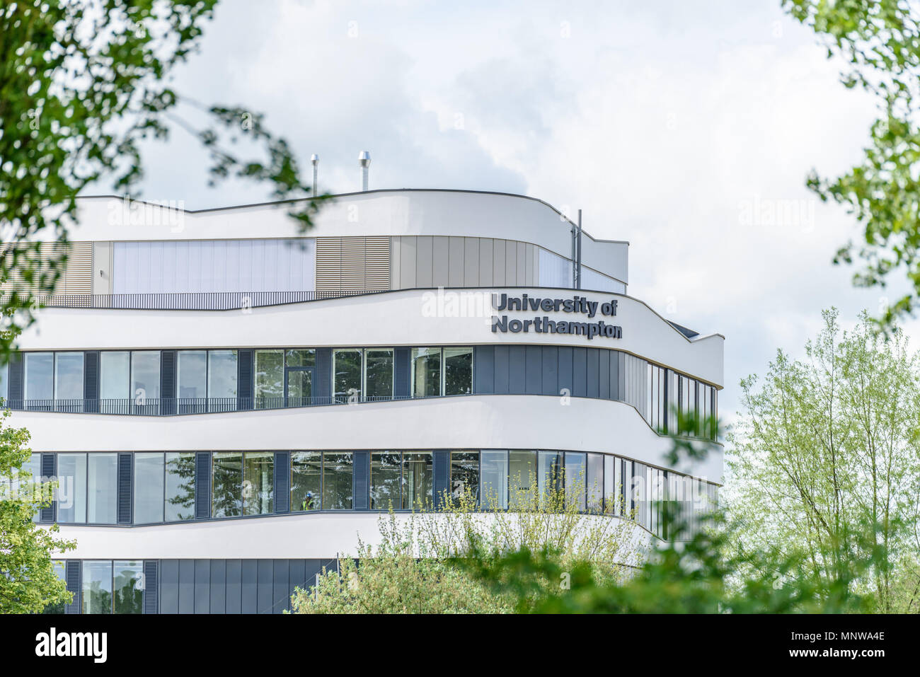 Northampton UK May 9, 2018: University of Northampton logo sign on new building on nene river. Stock Photo
