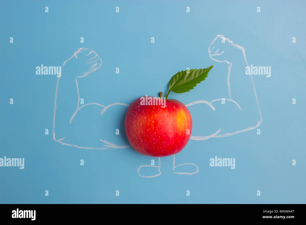 apple character with muscles. fitness and healthy eating concept Stock