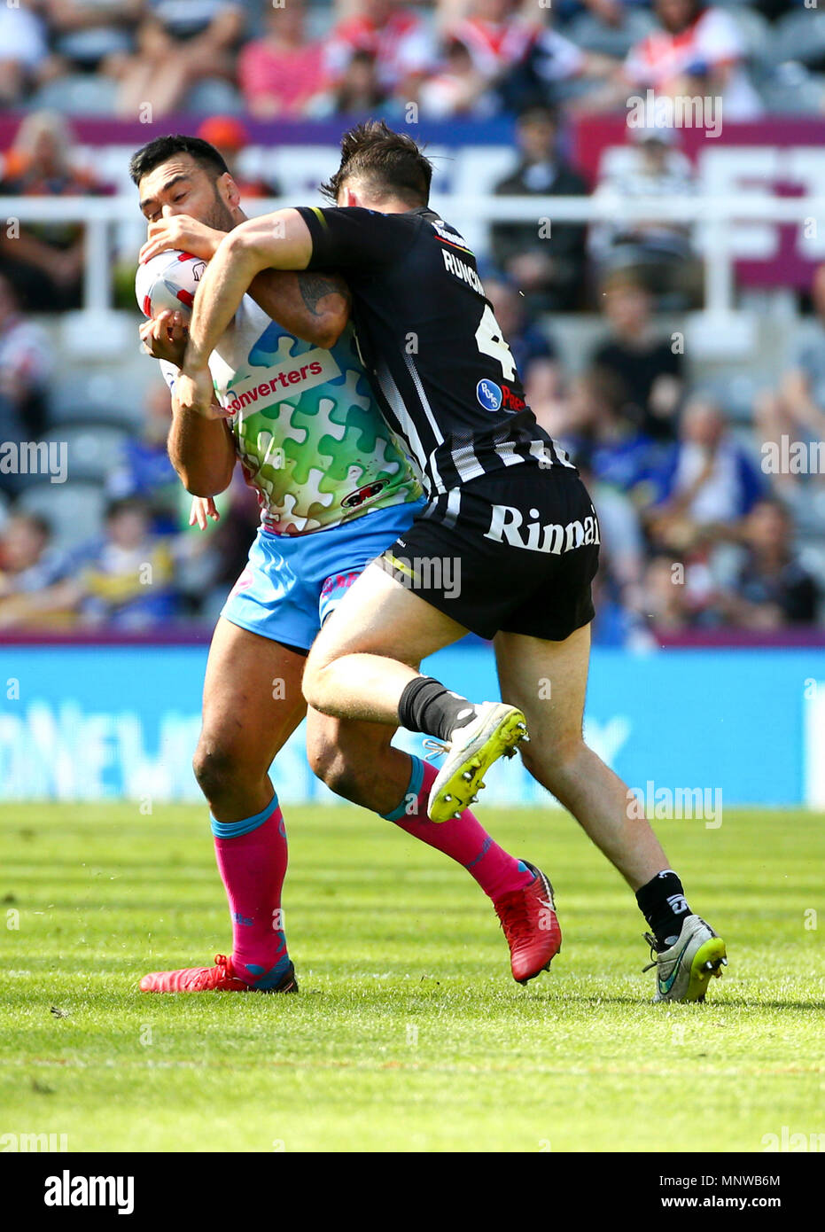 St James Park, Newcastle, UK. 19th May, 2018. Dacia Magic Weekend of Rugby League; Widnes Vikings versus St Helens; Zeb Taia of St Helens is tackled by Charly Runciman of Widnes Vikings Credit: Action Plus Sports/Alamy Live News Stock Photo