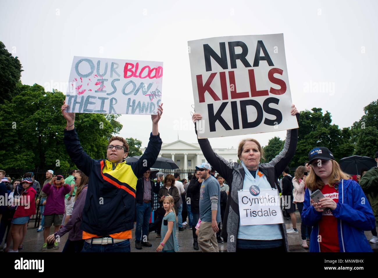 Washington, District of Columbia, USA. 19th May, 2018. Local high school students stage a ''lie-in'' in front of the White House to honor the victims of the Santa Fe High School shooting in Texas. The group is demanding the U.S. president and Congress work to pass gun control legislation. Credit: Erin Scott/ZUMA Wire/Alamy Live News Stock Photo