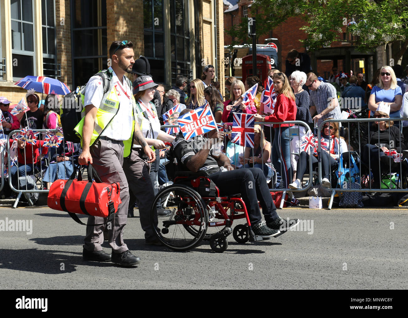 Windsor, UK, 19 May 2018. A person is wheeled away in a wheelchair by