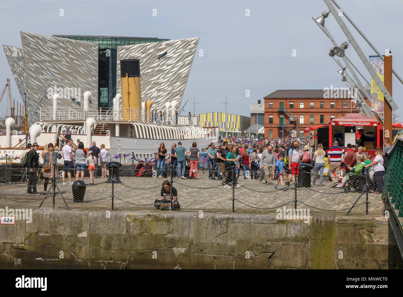 Belfast, UK, 19 May 2018. Titanic Quarter and Donegall Quay Belfast, Northern Ireland, UK. 19 May 2018. The Belfast Titanic Maritime Festival is being held today and tomorrow (Sunday 20th May). The maritime-themed festival is centred around the docks and has visiting ships, tall ships and family themed events as well as a food market. Credit: David Hunter/Alamy Live News. Stock Photo