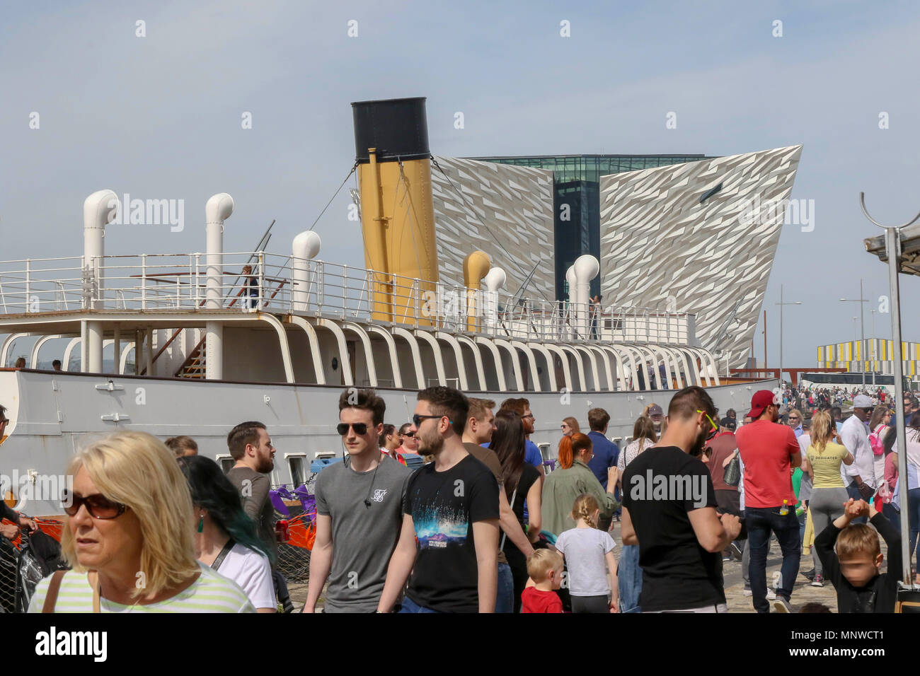Belfast, UK, 19 May 2018. Titanic Quarter and Donegall Quay Belfast, Northern Ireland, UK. 19 May 2018. The Belfast Titanic Maritime Festival is being held today and tomorrow (Sunday 20th May). The maritime-themed festival is centred around the docks and has visiting ships, tall ships and family themed events as well as a food market. Credit: David Hunter/Alamy Live News. Stock Photo