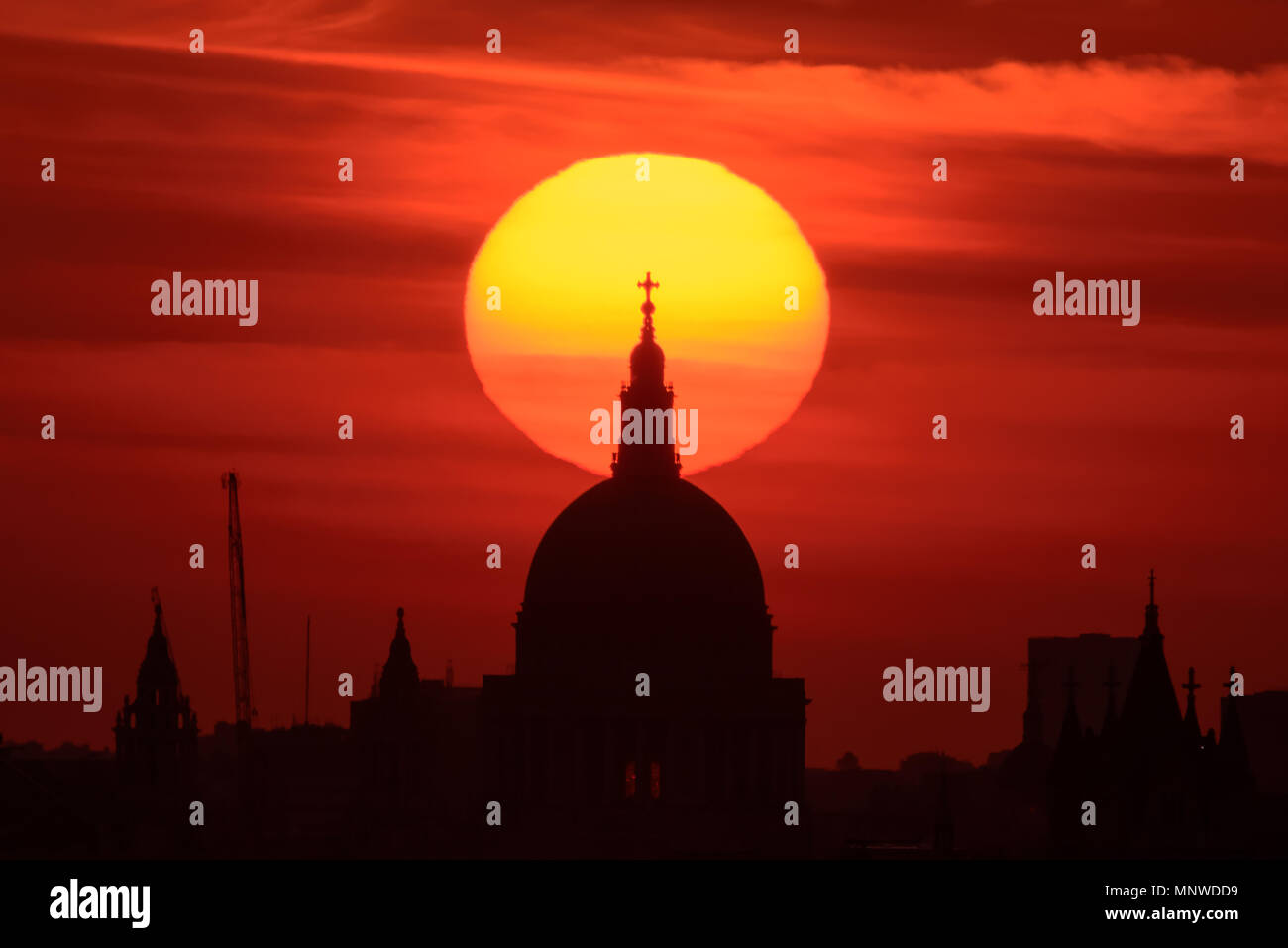 London, UK. 19th May, 2018. UK Weather: Dramatic evening sunset over St. Paul’s Cathedral. Credit: Guy Corbishley/Alamy Live News Stock Photo