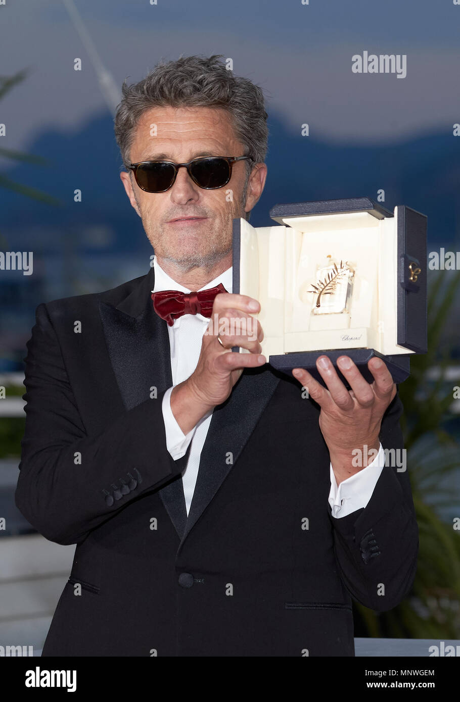Director Pawel Pawlikowski poses with the Best Director award for 'Cold War' (Zimna Wojna) at the photocall the Palme D'Or Winner during the the 71st annual Cannes Film Festival at Palais des Festivals on May 19, 2018 in Cannes, France. (Photo by Oleg Nikishin) Stock Photo