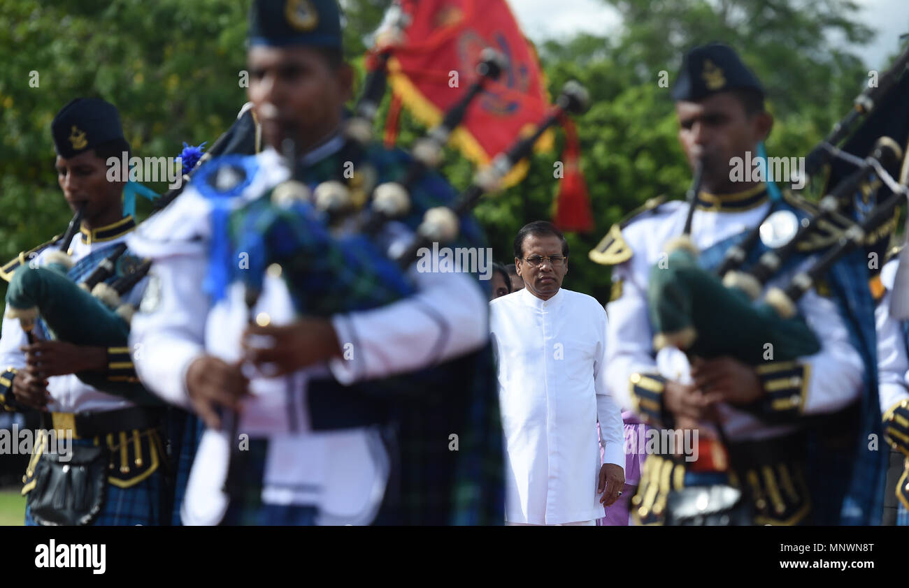 Colombo, Sri lanka. 19th May, 2018. Sri Lankan President Maithripala Sirisena (C) arrives during a commemorative ceremony marking the 9th anniversary of the end of the island's civil war in Colombo, Sri lanka, on May 19, 2018. Credit: A.S. Hapuarachc/Xinhua/Alamy Live News Stock Photo
