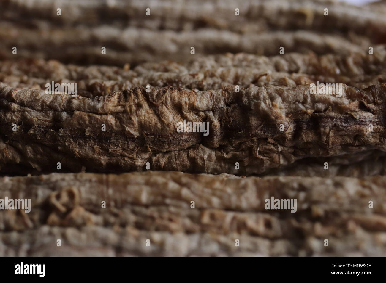 Drying Bananas Process. Stack of Dried Bananas. Macro Closeup Stock