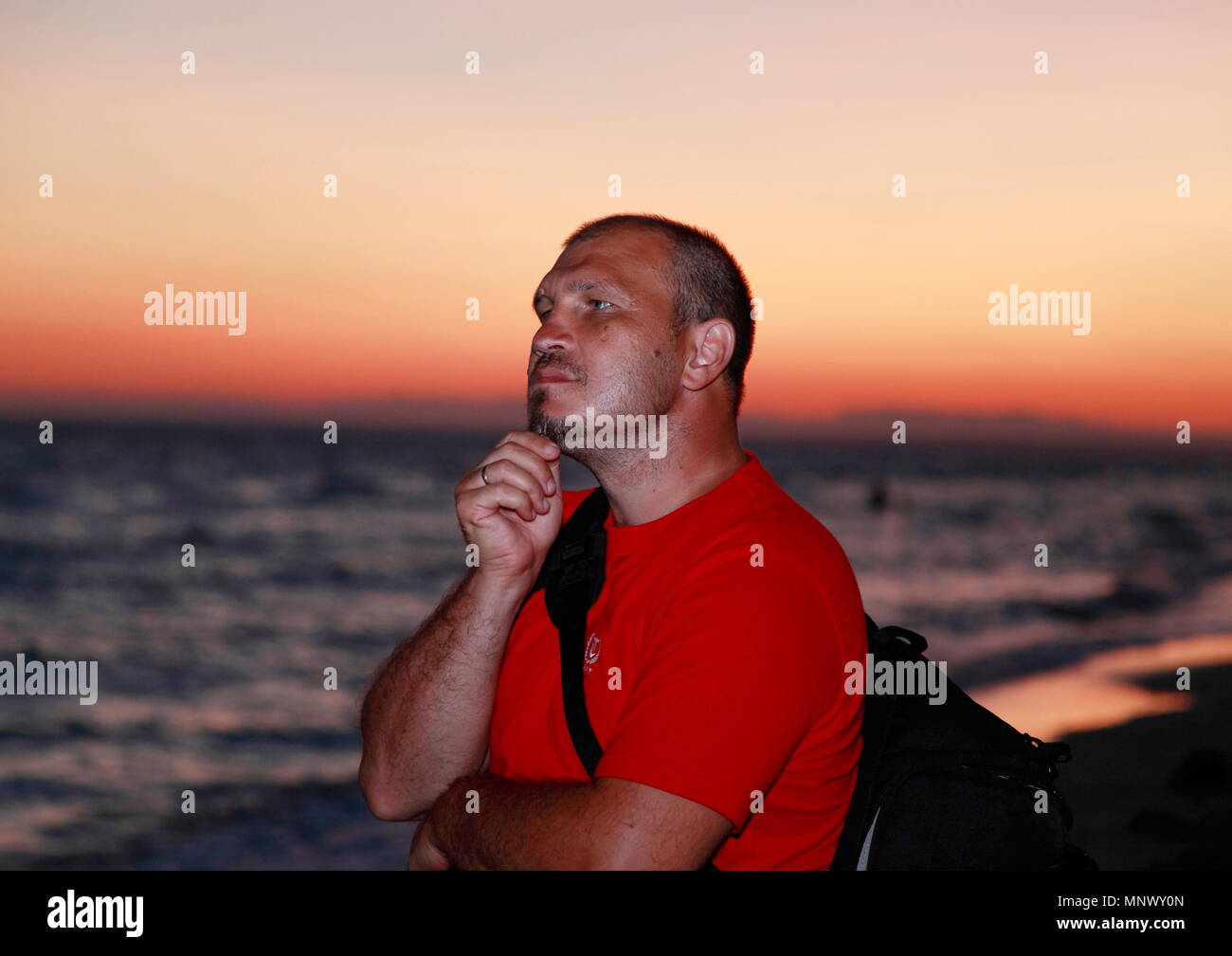 Watching sunset over sea hi-res stock photography and images - Alamy