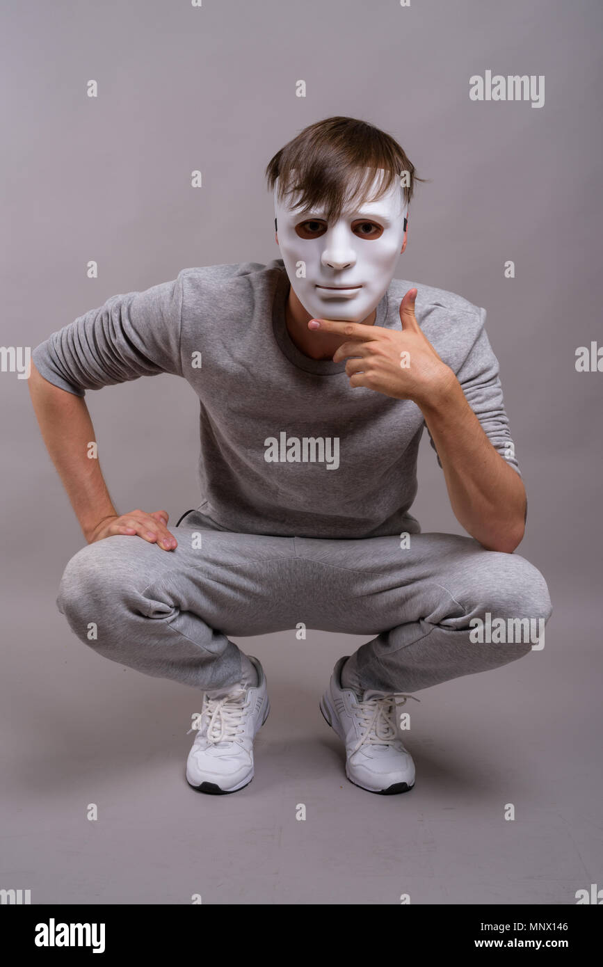 Man wearing an anonymous mask hi-res stock photography and images - Alamy