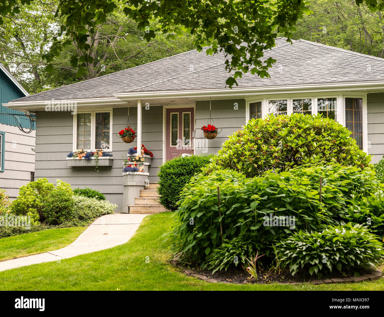 Old style bungalow from the 60s or 70s. Stock Photo