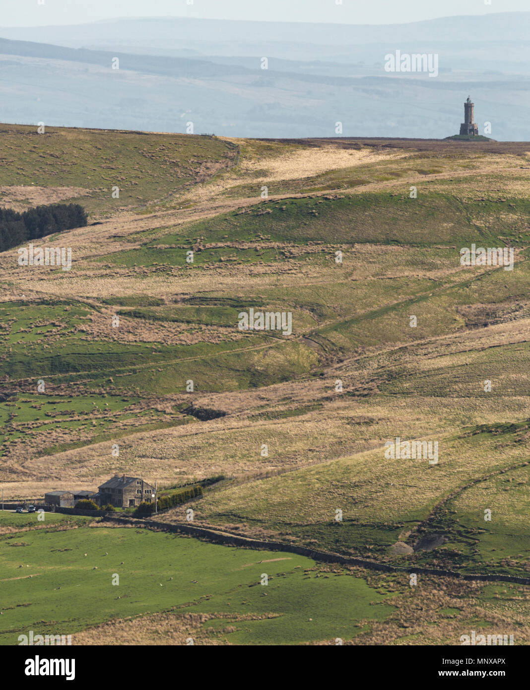 Darwen Tower (Jubilee Tower) and a view of the West Pennine Moors showing the emptiness and bleak beauty of the area. Stock Photo