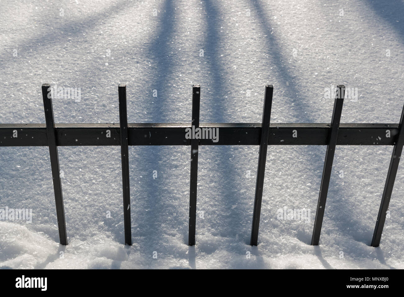 steel fence fence in winter in the daytime Stock Photo