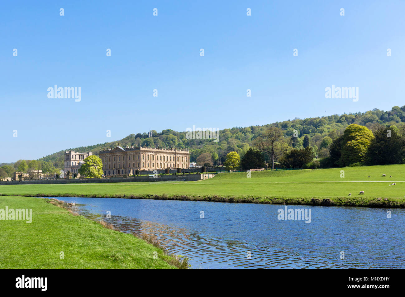 Chatsworth House from the banks of the River Derwent, Chatsworth Park, Derbyshire, England, UK Stock Photo