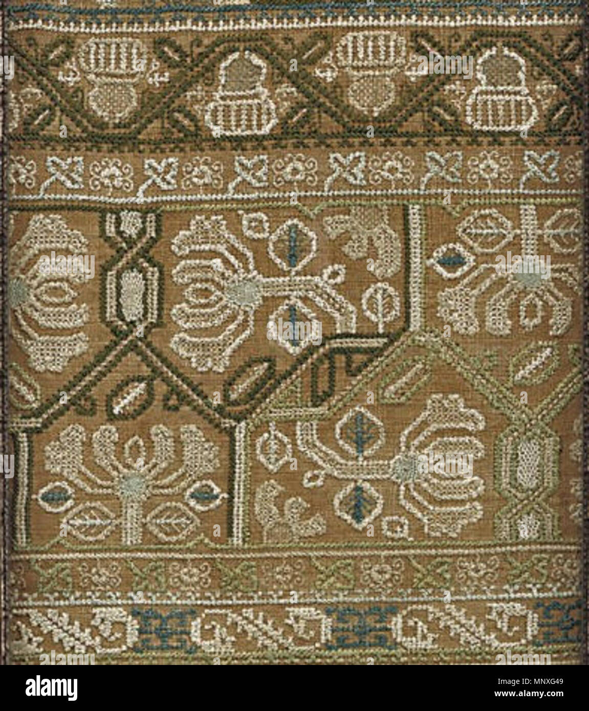 . Detail of needlework band sampler, c. 1660, buff coloured linen worked with an alphabet and endless knot details . circa 1660. signed 'E.S.' (unknown) 1147 Stuart band sampler detail 2 Stock Photo