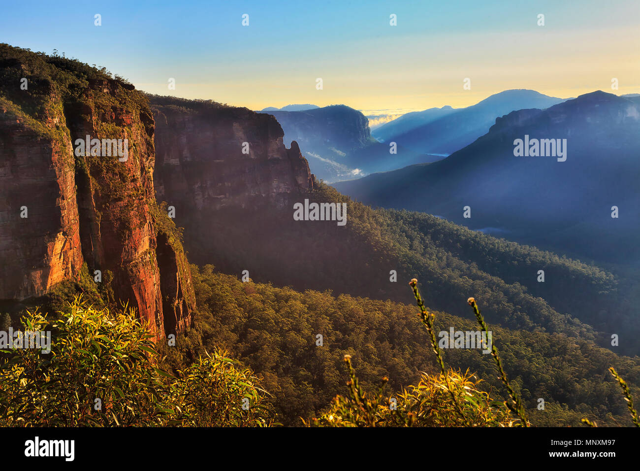 Govett leap rugged rock formation in grand canyon near Blackheath at Blue Mountains national park at sunrise Stock Photo