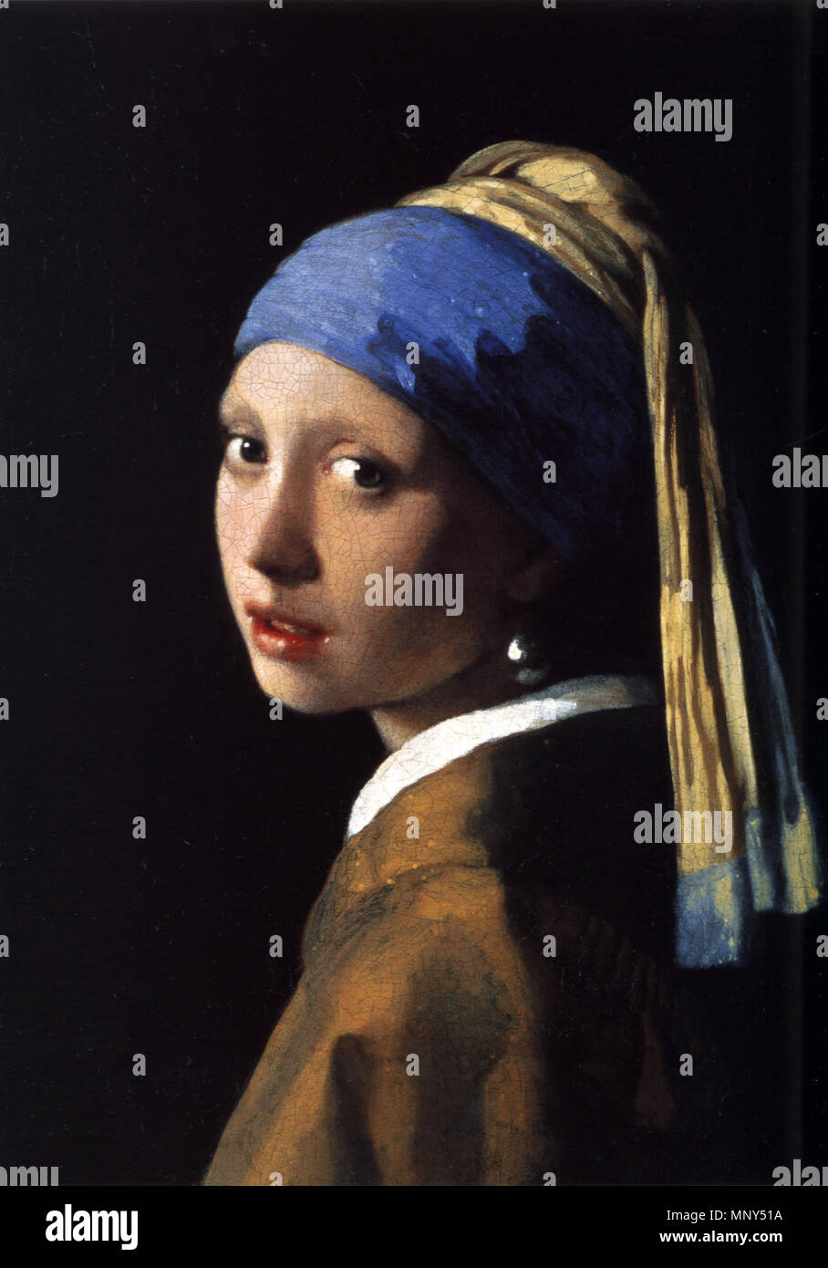 Het meisje met de parel (Girl with a Pearl Earring)   circa 1665.   1230 Johannes Vermeer (1632-1675) - The Girl With The Pearl Earring (1665) Stock Photo