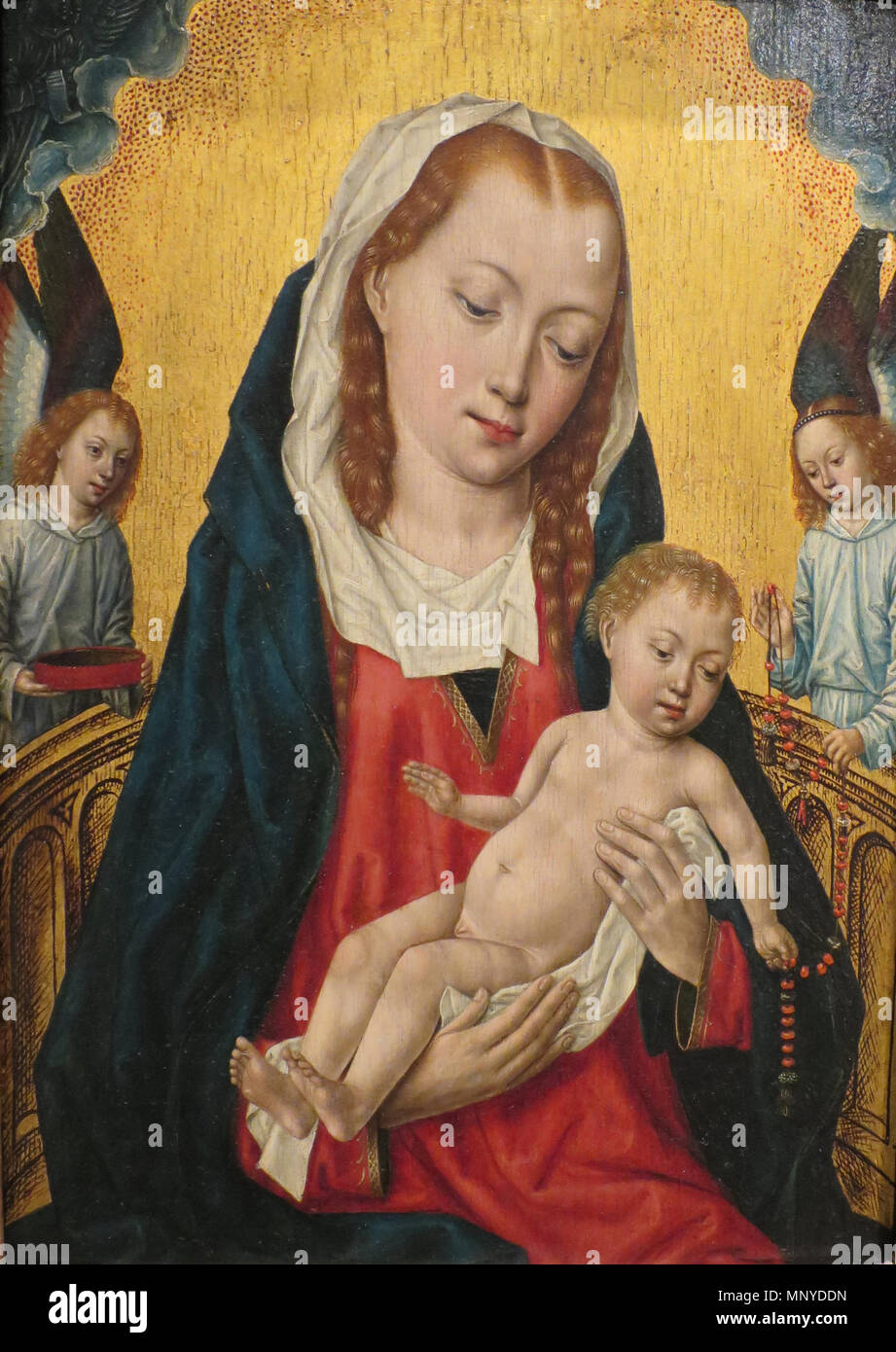 . Master of the Saint Ursula Legend (died  ) Virgin and Child with Two Angels, circa 1485 Painting, oil and tempera on panel, 13 5/16 x 9 1/2 in. (33.7 x 24.1 cm); framed: 16 3/4 x 13 x 2 in. (42.55 x 33.02 x 5.08 cm); sight: 12 5/8 x 8 7/8 in. (32.07 x 22.54 cm) Mr. and Mrs. Allan C. Balch Collection (M.44.2.6) . circa 1485. Master of the Saint Ursula Legend 1271 WLA lacma Virgin and Child with Two Angels Stock Photo